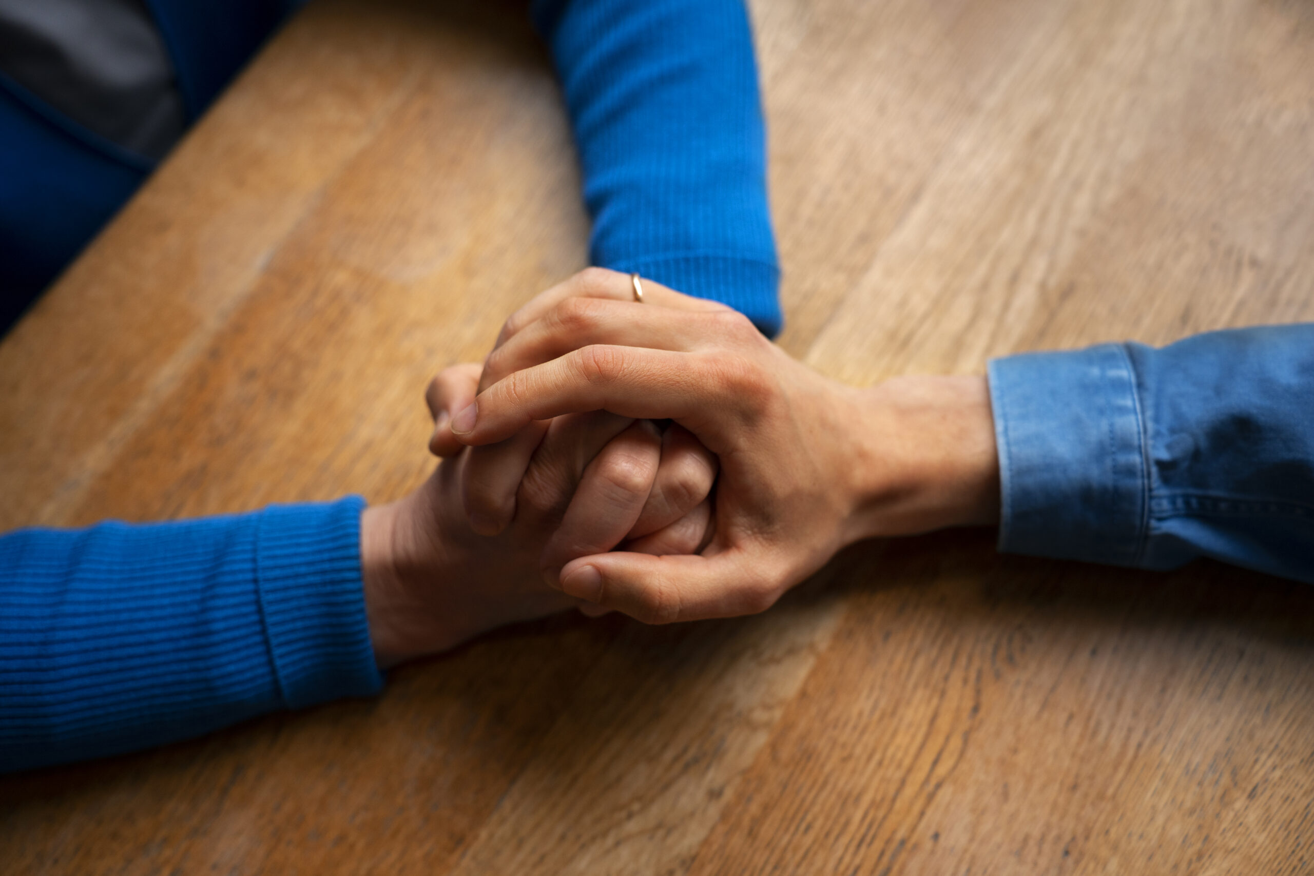 hands holding each other support